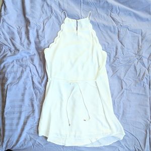 White scallop mini dress, perfect for bachelorette